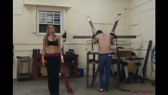 Taylor gets punished with the whip by her mistress